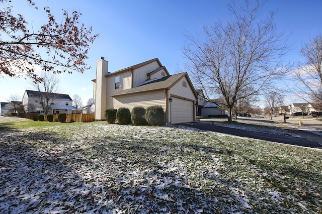 view of home's exterior featuring a garage