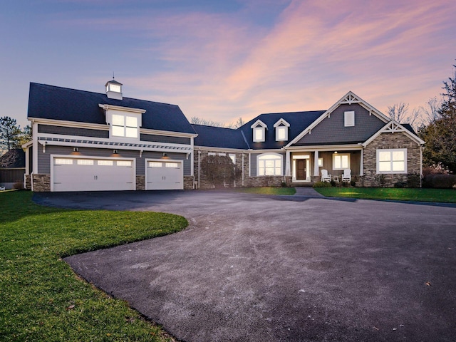 view of front of house with a yard