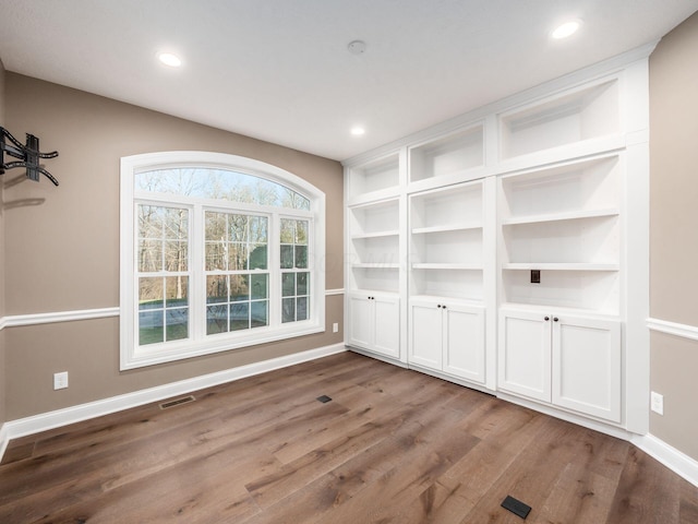 interior space with hardwood / wood-style floors