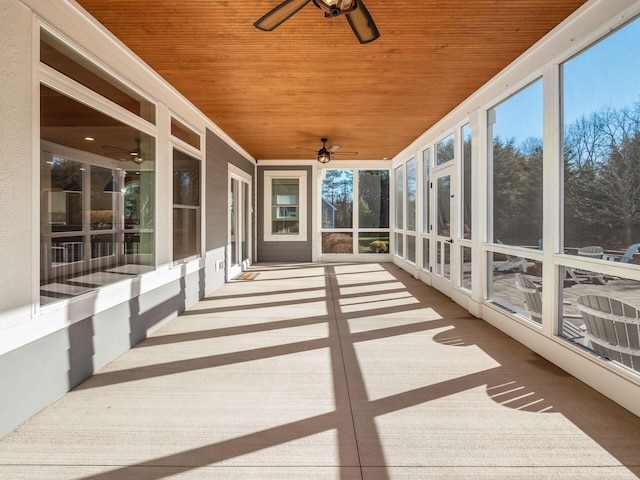 unfurnished sunroom featuring wooden ceiling