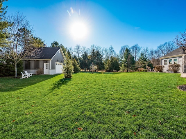 view of yard with a garage