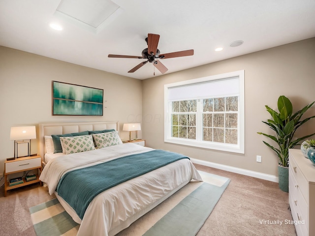 bedroom with ceiling fan and carpet flooring