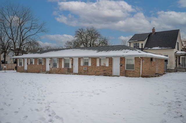 view of snow covered property