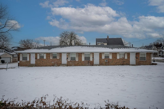 view of snow covered property