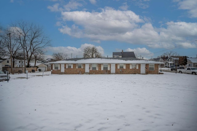 view of snow covered house