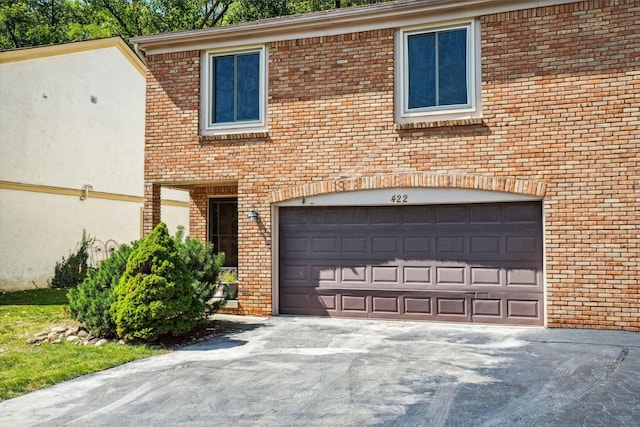 exterior space featuring a garage