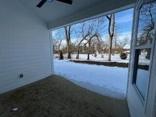 yard covered in snow with ceiling fan