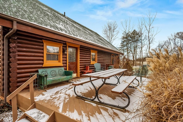 deck featuring outdoor dining area