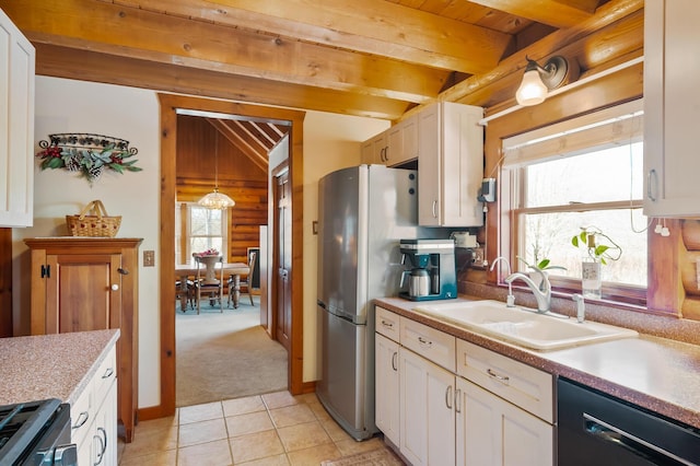 kitchen featuring vaulted ceiling with beams, light tile patterned floors, stove, a sink, and dishwasher