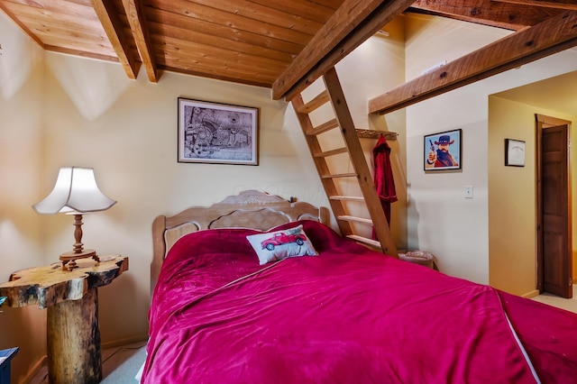 bedroom featuring wooden ceiling and beamed ceiling