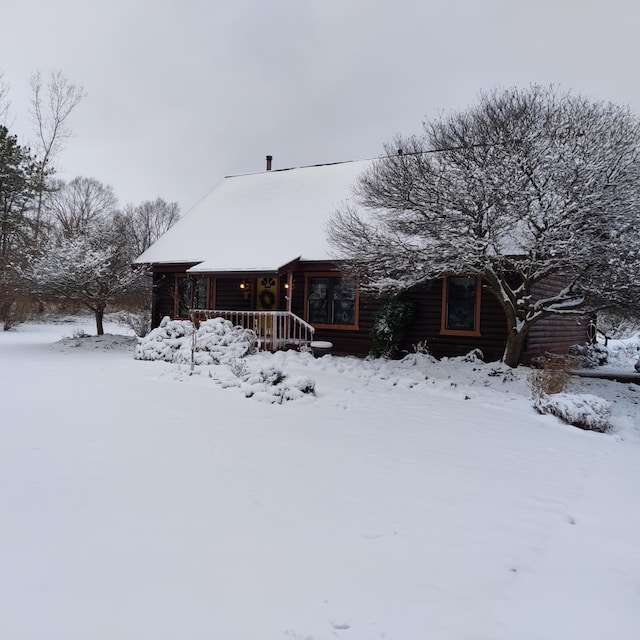 log-style house with log veneer siding