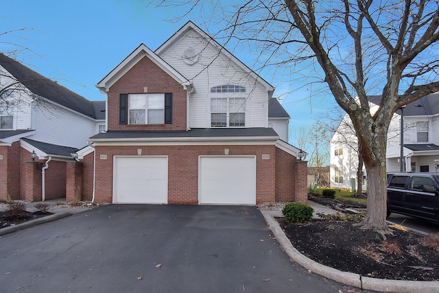 front of property with a garage