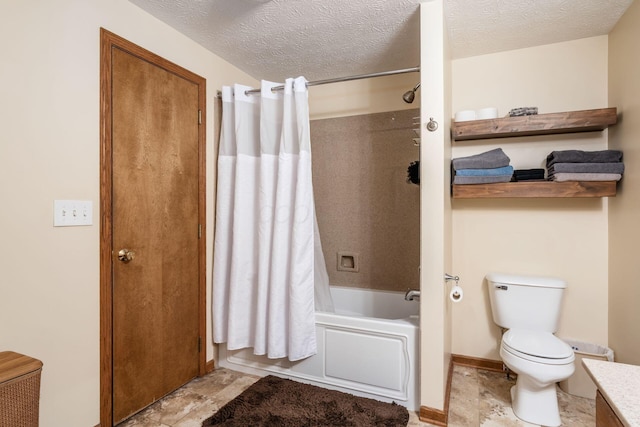 full bathroom with shower / bath combo, a textured ceiling, toilet, and vanity