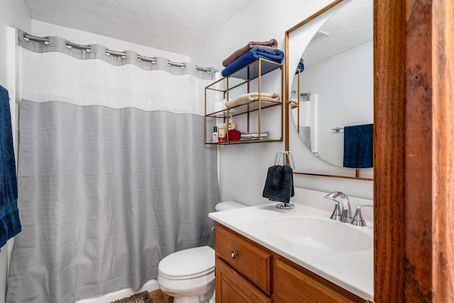 bathroom with toilet, a textured ceiling, a shower with shower curtain, and vanity