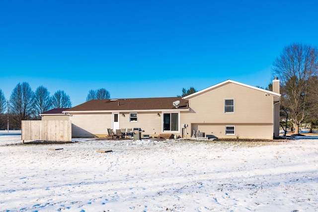 view of snow covered house