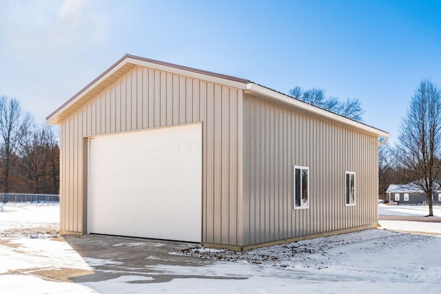 view of snow covered garage