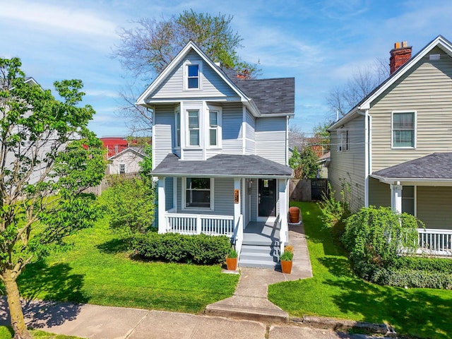 view of front facade featuring a porch and a front yard