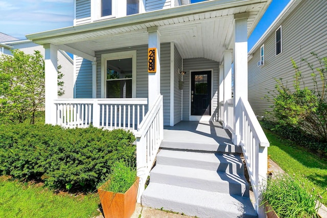 doorway to property with a porch