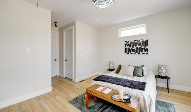 bedroom featuring hardwood / wood-style floors