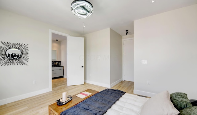 bedroom featuring light wood-type flooring