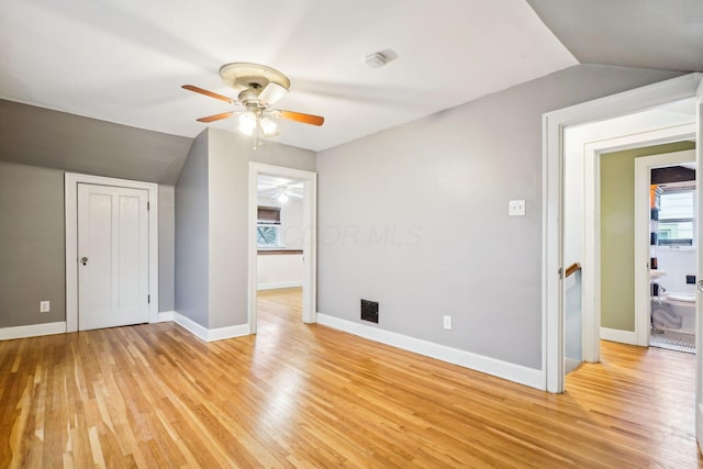 bonus room with ceiling fan, light hardwood / wood-style floors, and lofted ceiling