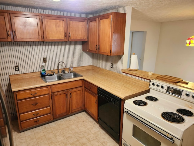 kitchen with sink, dishwasher, white electric range, kitchen peninsula, and a textured ceiling