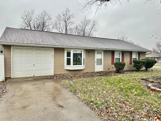 single story home featuring a garage