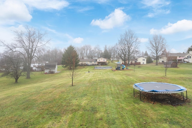 view of yard featuring a trampoline