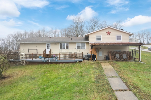 back of house with a lawn and a wooden deck