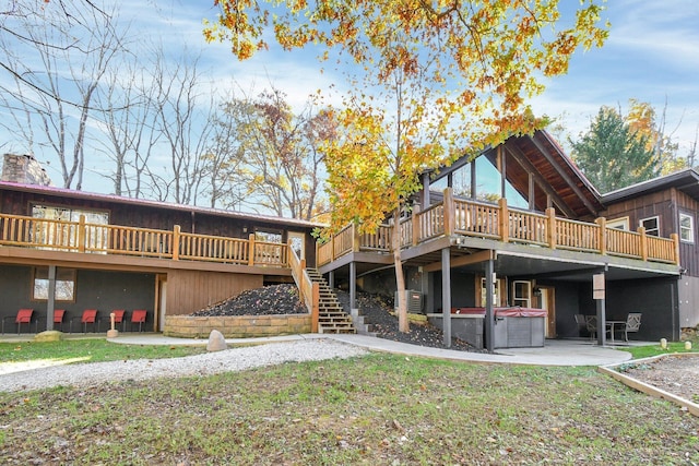 14485 Jack Run Rd, Rockbridge, OH 43149 - back of house with a hot tub, a wooden deck, a patio area, and stairs