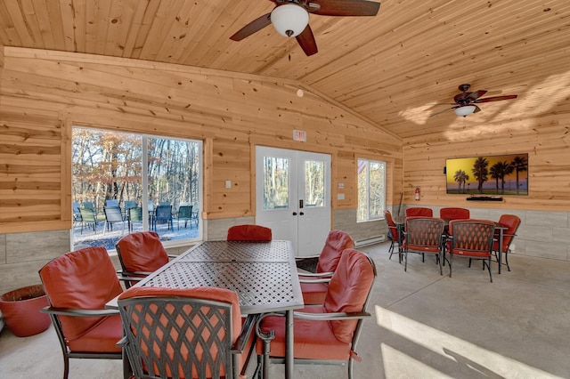 14485 Jack Run Rd, Rockbridge, OH 43149 - dining area featuring a ceiling fan, wood walls, lofted ceiling, concrete flooring, and wood ceiling