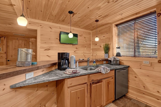 14485 Jack Run Rd, Rockbridge, OH 43149 - kitchen featuring stainless steel dishwasher, a sink, wood ceiling, wood walls, and hanging light fixtures