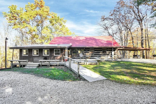 14485 Jack Run Rd, Rockbridge, OH 43149 - view of front of house featuring metal roof and board and batten siding