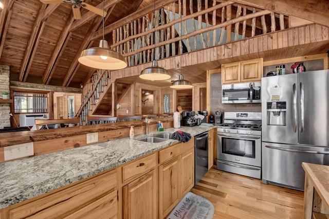 14485 Jack Run Rd, Rockbridge, OH 43149 - kitchen with stainless steel appliances, wood ceiling with exposed beams, light wood-style flooring, light stone countertops, and ceiling fan