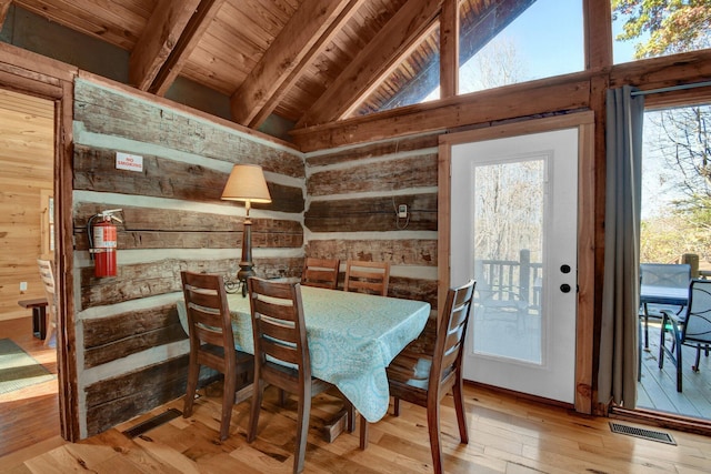 14485 Jack Run Rd, Rockbridge, OH 43149 - dining area with wood ceiling, hardwood / wood-style floors, and wood walls