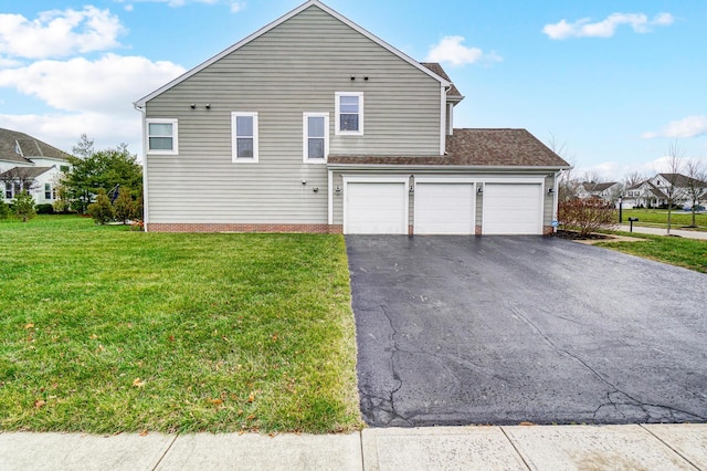 view of property exterior featuring a yard and a garage