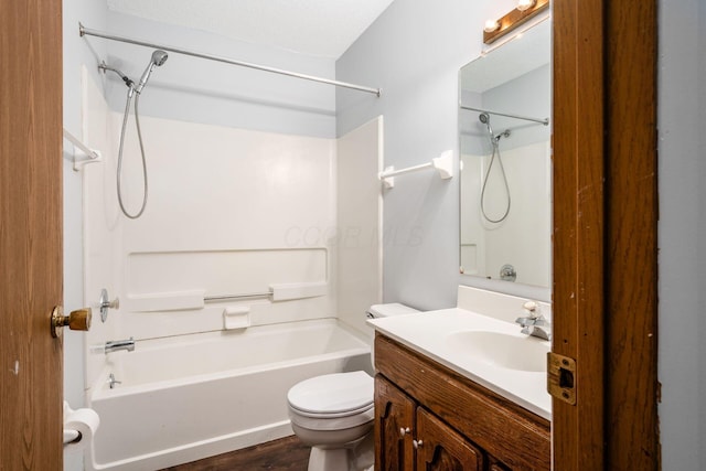 full bathroom featuring vanity,  shower combination, toilet, and wood-type flooring