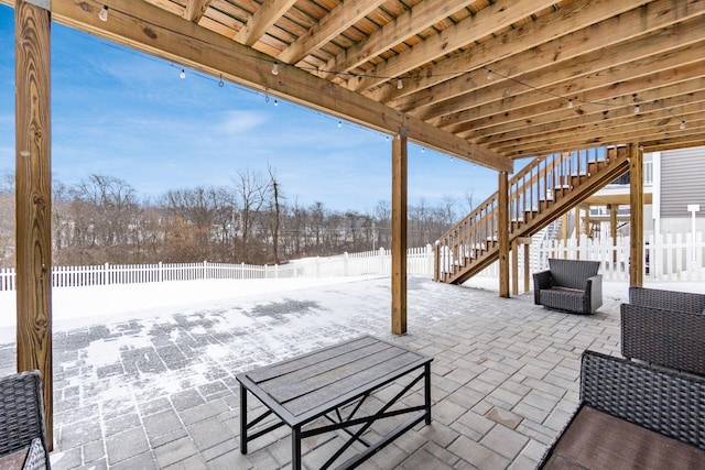 view of snow covered patio