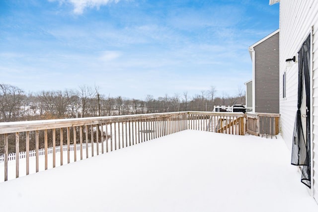 view of snow covered deck