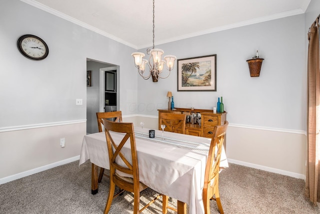 carpeted dining room with an inviting chandelier and crown molding