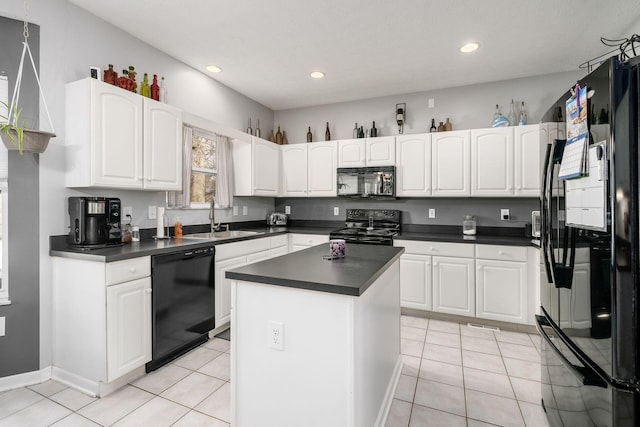 kitchen featuring a center island, sink, white cabinets, light tile patterned flooring, and black appliances