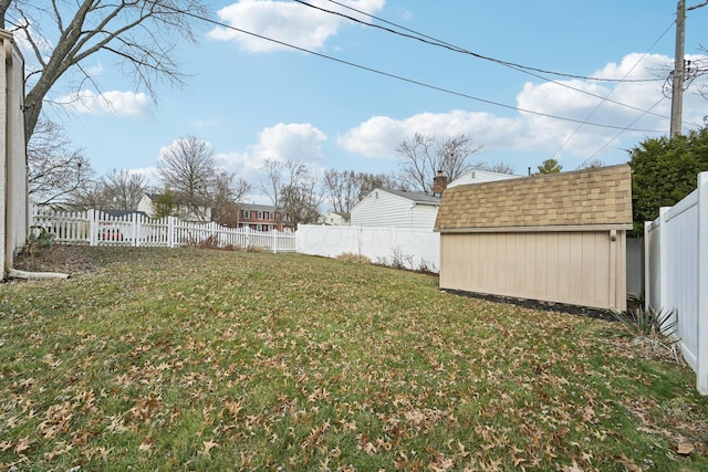 view of yard with a storage shed