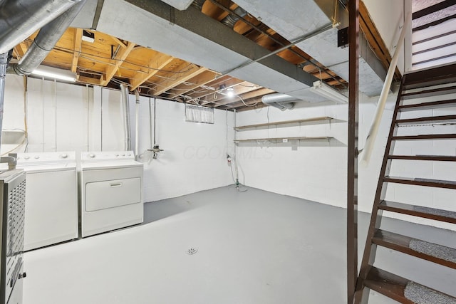 basement with washing machine and dryer