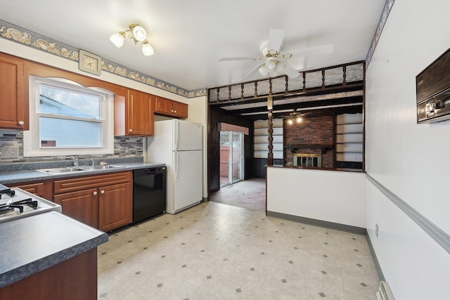 kitchen featuring decorative backsplash, ceiling fan, sink, dishwasher, and white fridge