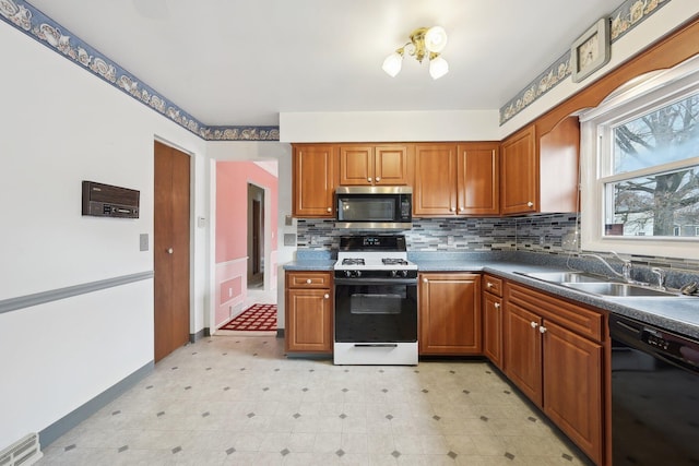 kitchen with backsplash, sink, a notable chandelier, black dishwasher, and white gas stove