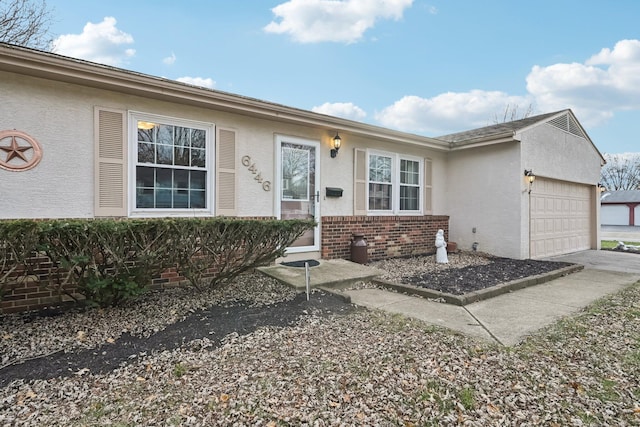 single story home with a garage