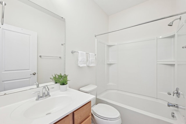 full bathroom featuring toilet, vanity, and shower / bathtub combination