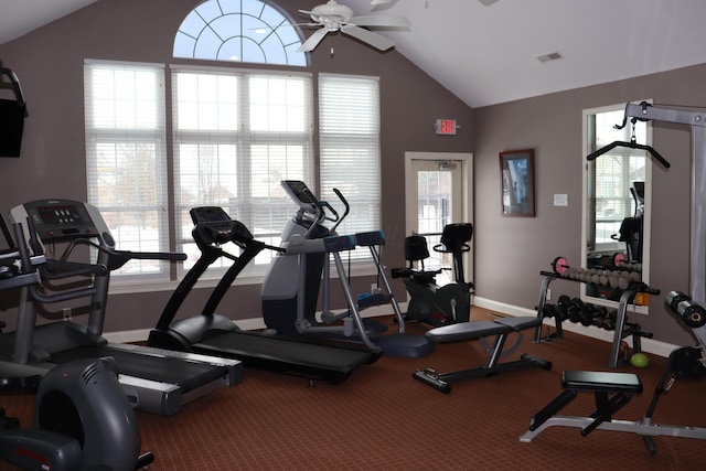 exercise room with ceiling fan, vaulted ceiling, and carpet floors