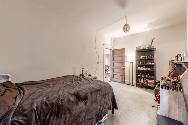 bedroom with light colored carpet