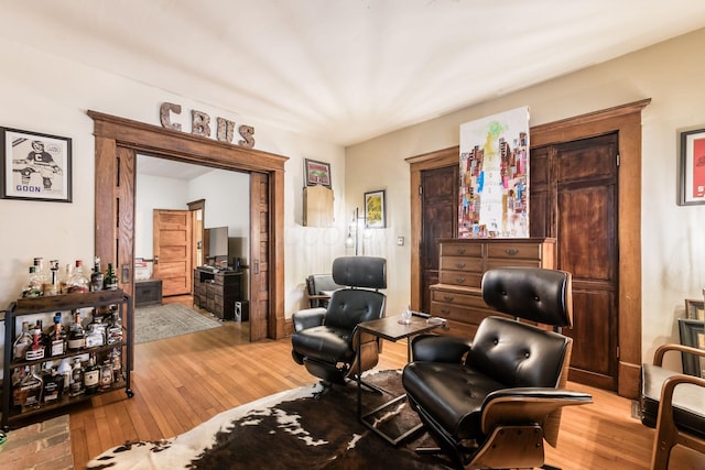 sitting room with light hardwood / wood-style floors